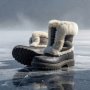 Heavy insulated winter boots with thick rubber soles for ice